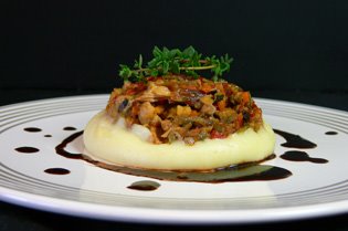 timbal de cordero Timbal de cordero con puré de patatas